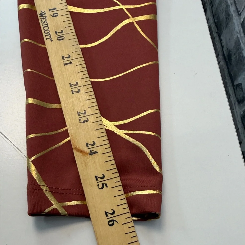 Nike running Copper and Gold Patterned Leggings‎